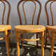 Set of 4 bentwood bistro chairs with caning.