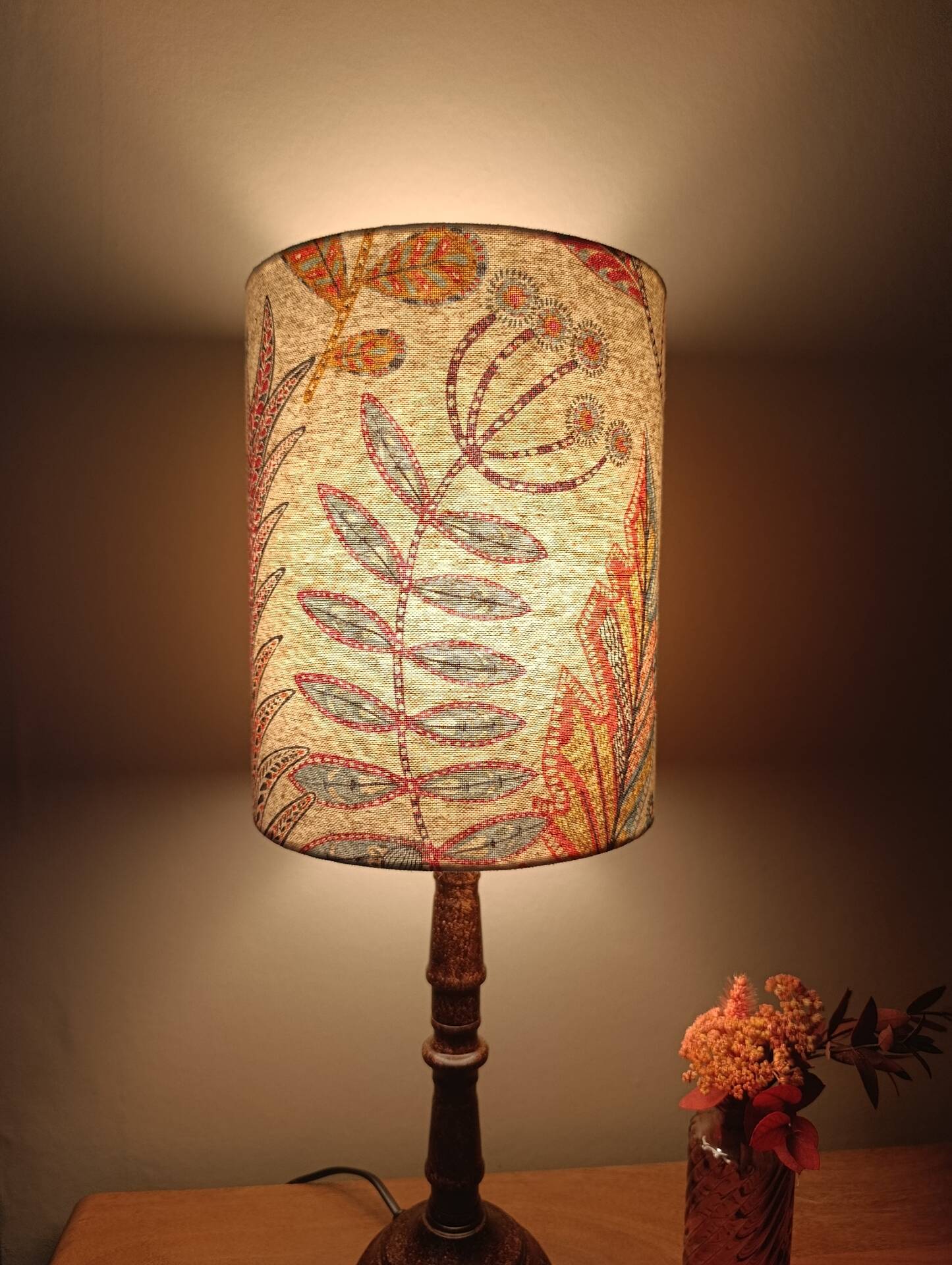 Aged metal table lamp, botanical shade