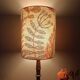 Aged metal table lamp, botanical shade