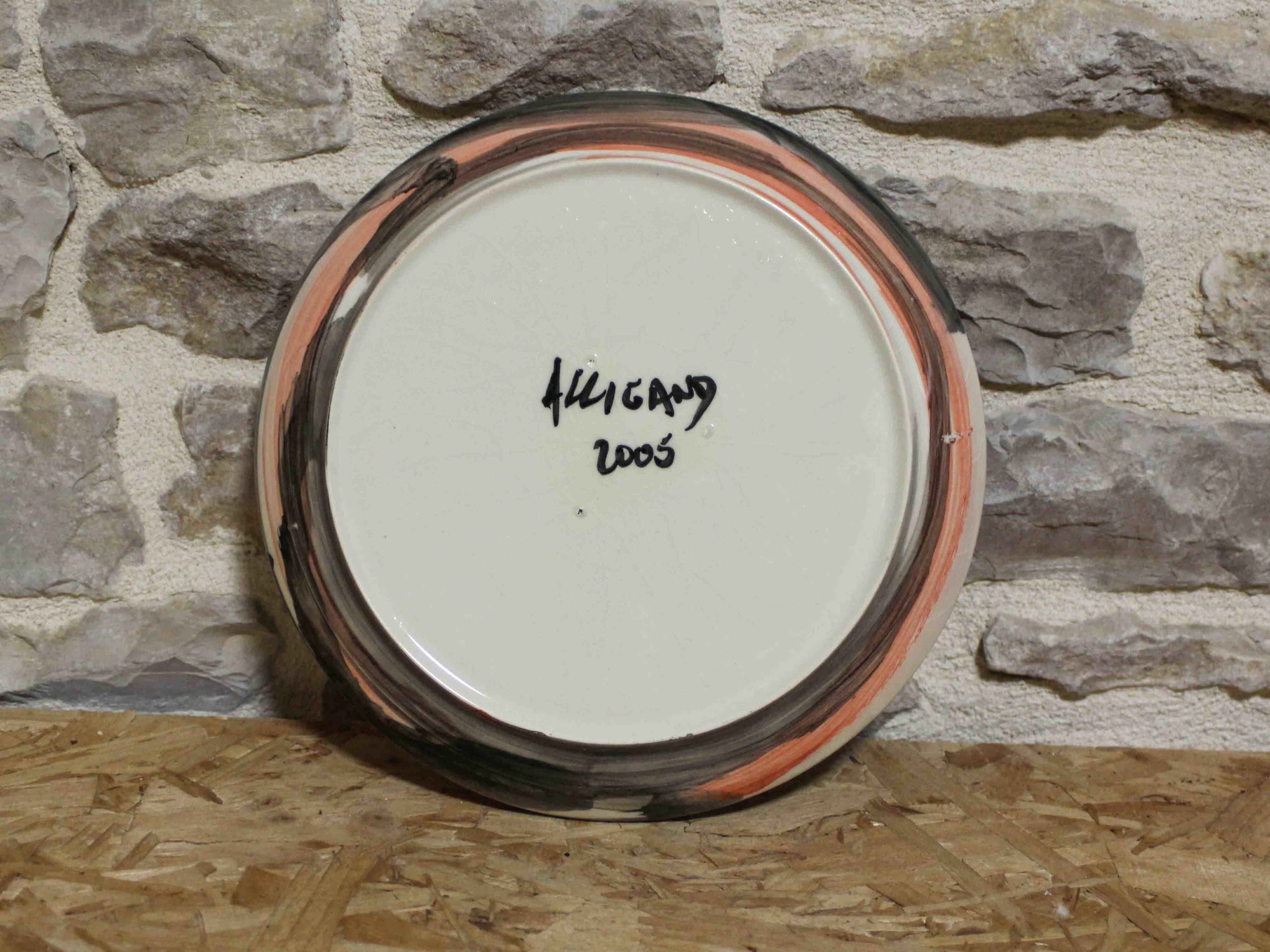 Painted plate signed Alligand