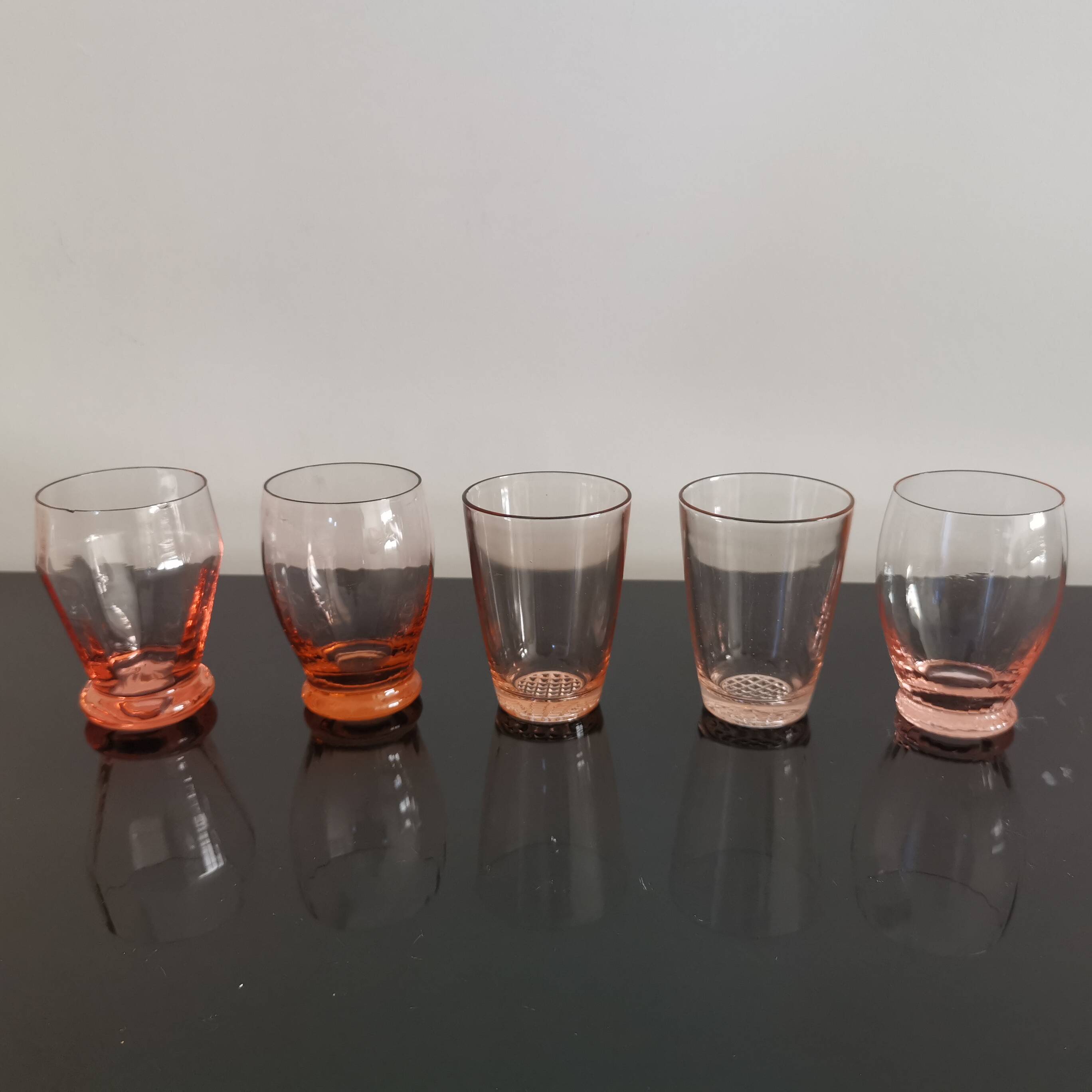 5 mismatched vintage pink glasses