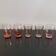 5 mismatched vintage pink glasses