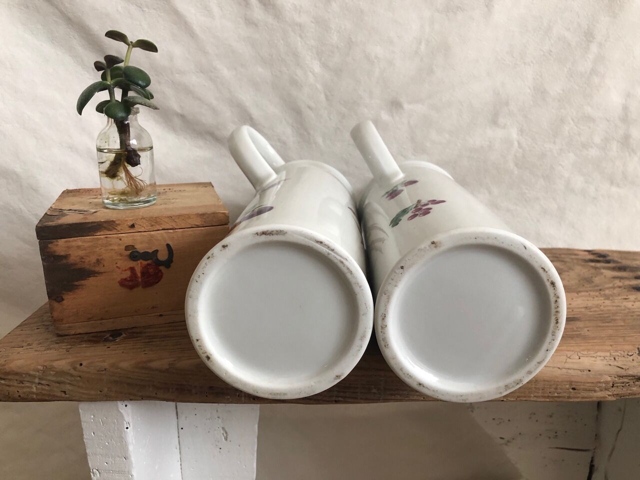 Porcelain bottle duo for mirabelle and raspberry brandy