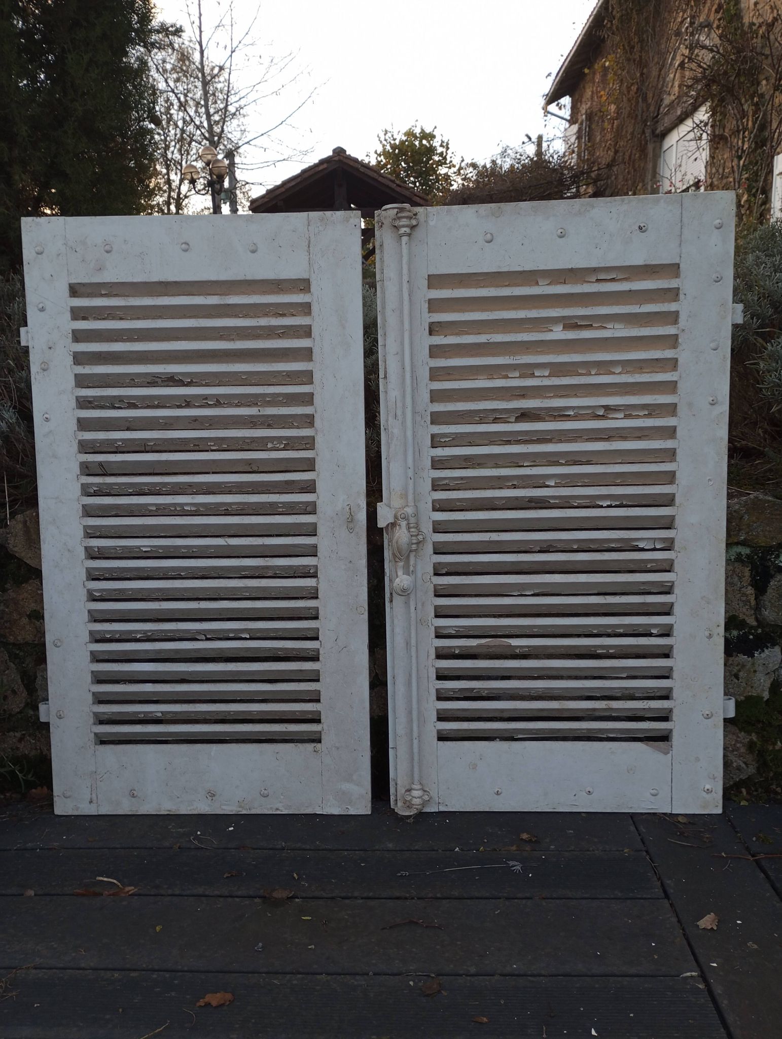 Pair of tropical wood shutters