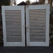 Pair of tropical wood shutters