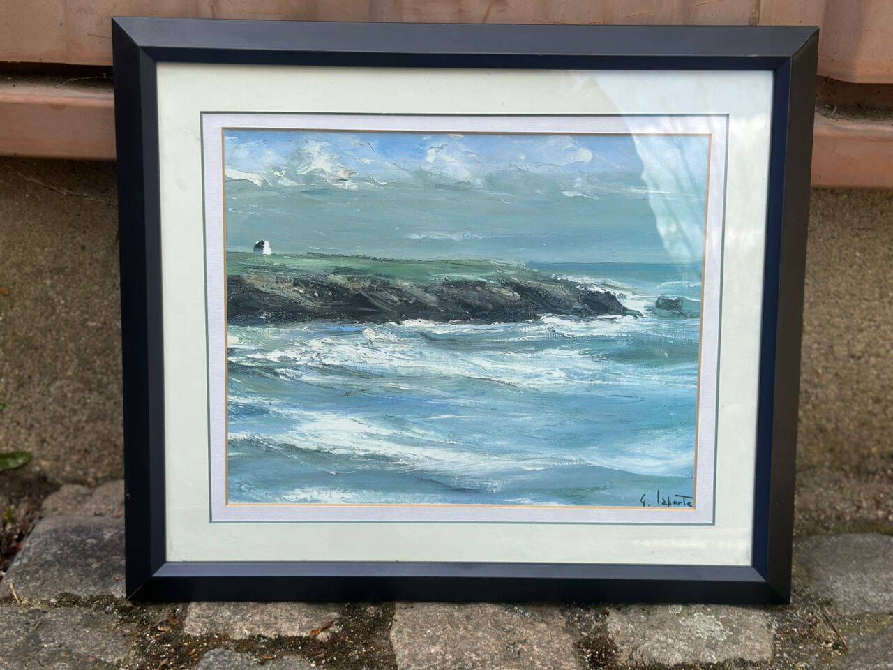 Framed oil painting on canvas of a seascape signed by Georges Laporte.