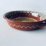 Colorful terracotta dish or salad bowl