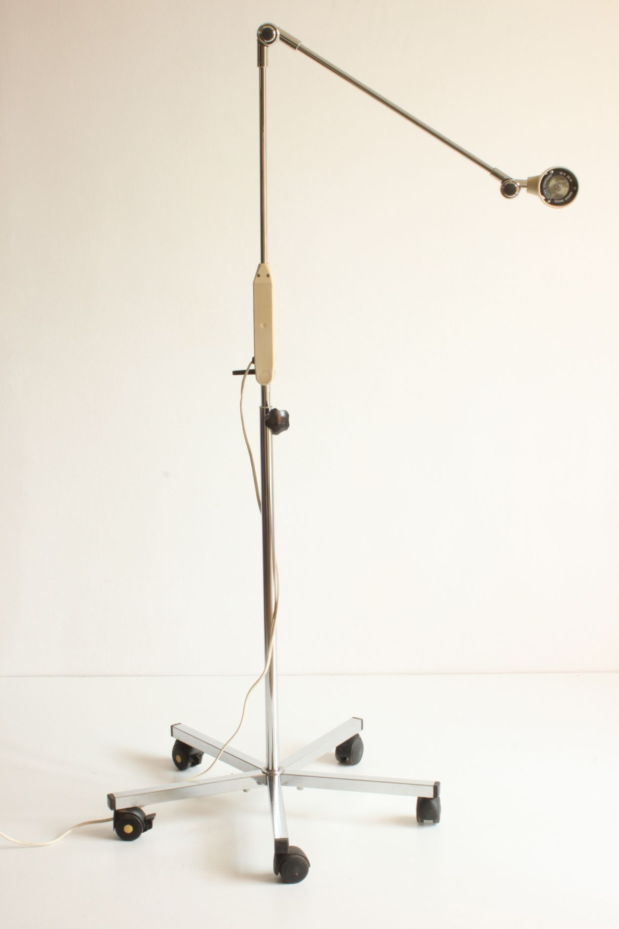 Vintage adjustable chrome medical precision light by Derungs Licht, Switzerland 1980s.