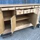 Scandinavian natural pine sideboard with 4 doors and 6 drawers.