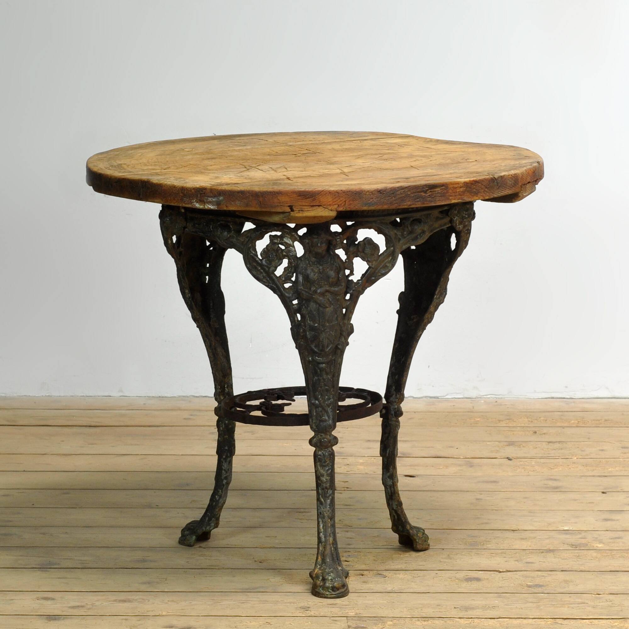 Cast iron garden table with pine top