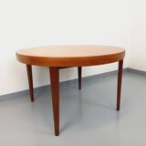 Large vintage Scandinavian round table from the 50s 60s in teak with extensions