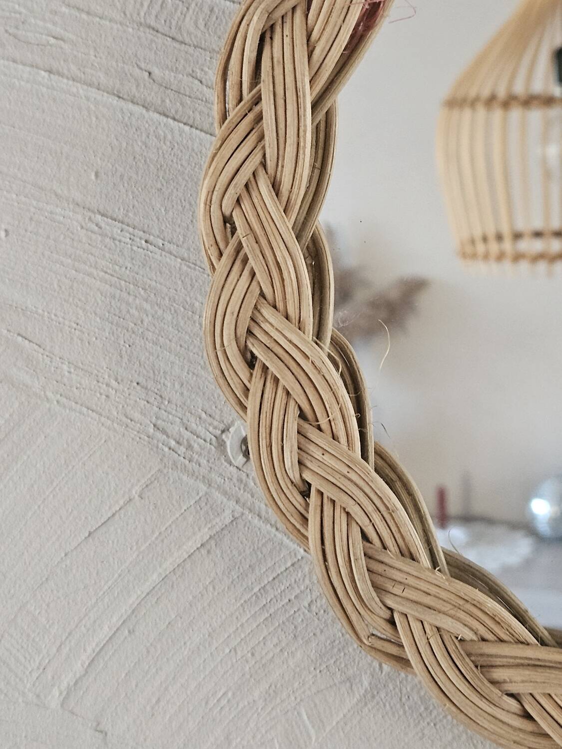 Old small round wicker mirror