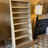 Painted wooden display shelf with an incline