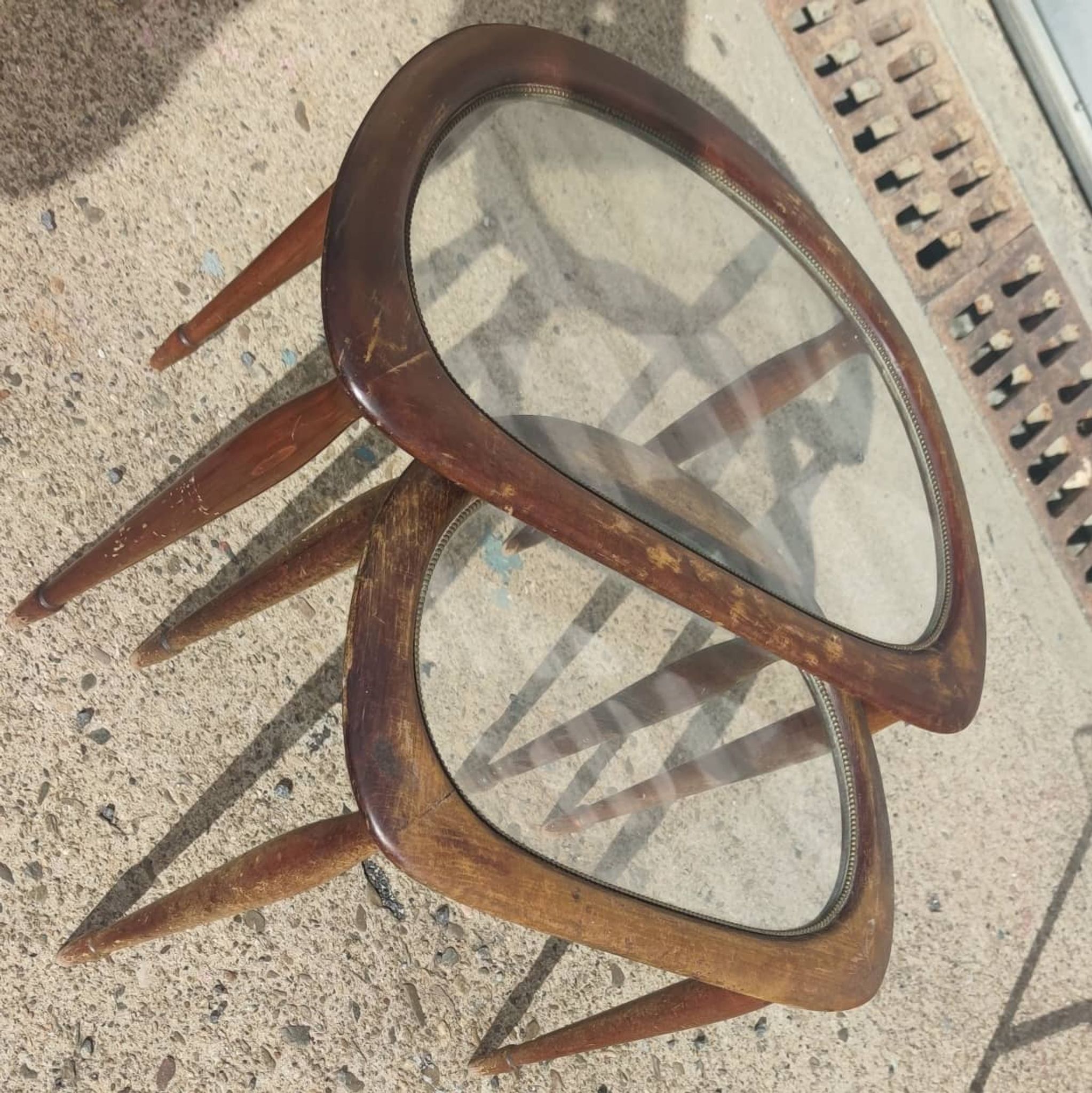 2 tables in mahogany, glass and bronze, circa 1960