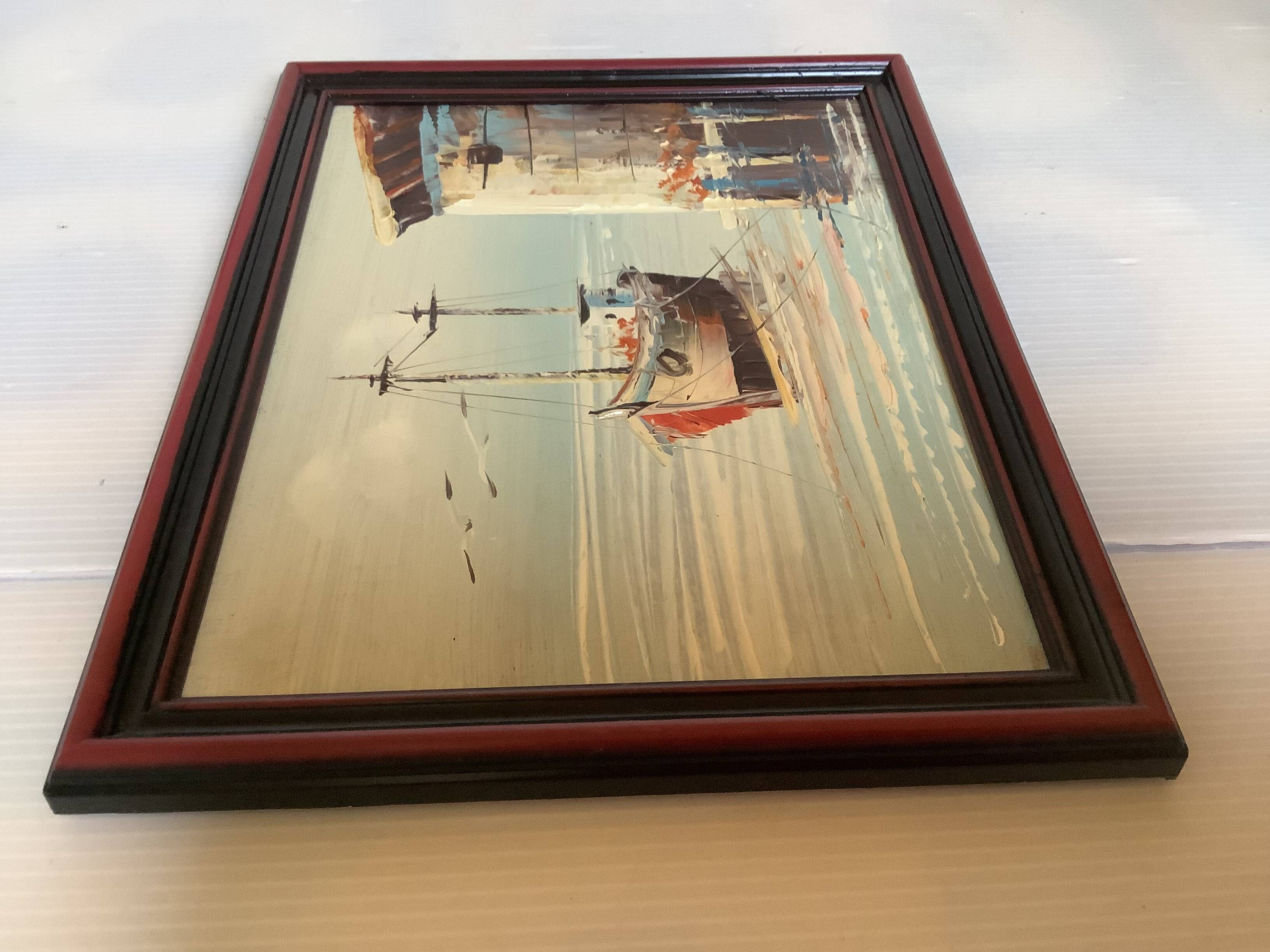 Small marine painting of a boat in oil on panel.