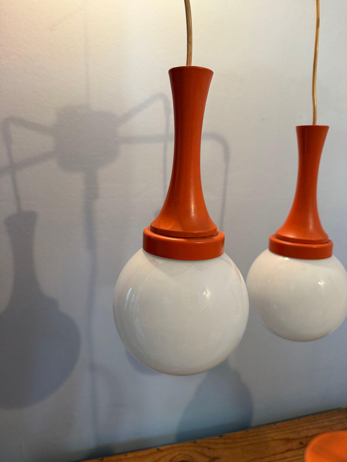 Suspension cascade design Space age orange vintage from the 70s.
