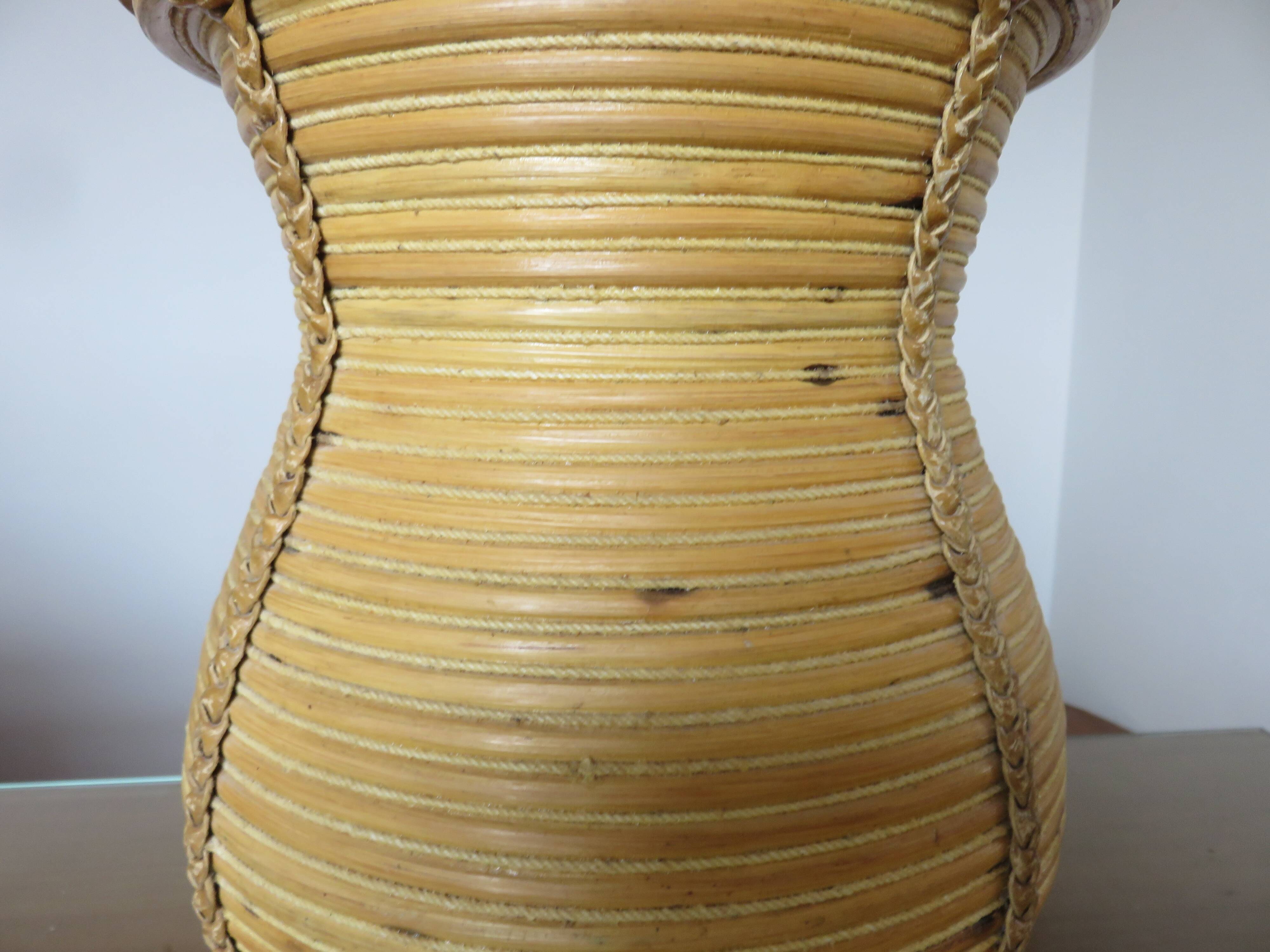 Rattan, leather, rope, and wood lamp in the style of Gabriella Crespi 60-70.