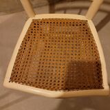 2 white wooden chairs