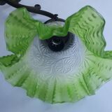 Antique brass wall light with art deco molded glass