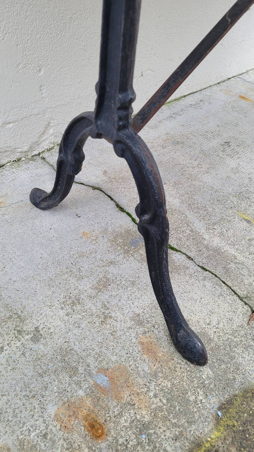 Antique cast iron bistro table with oval marble top