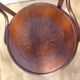 Swivel wooden armchair, pattern on seat
