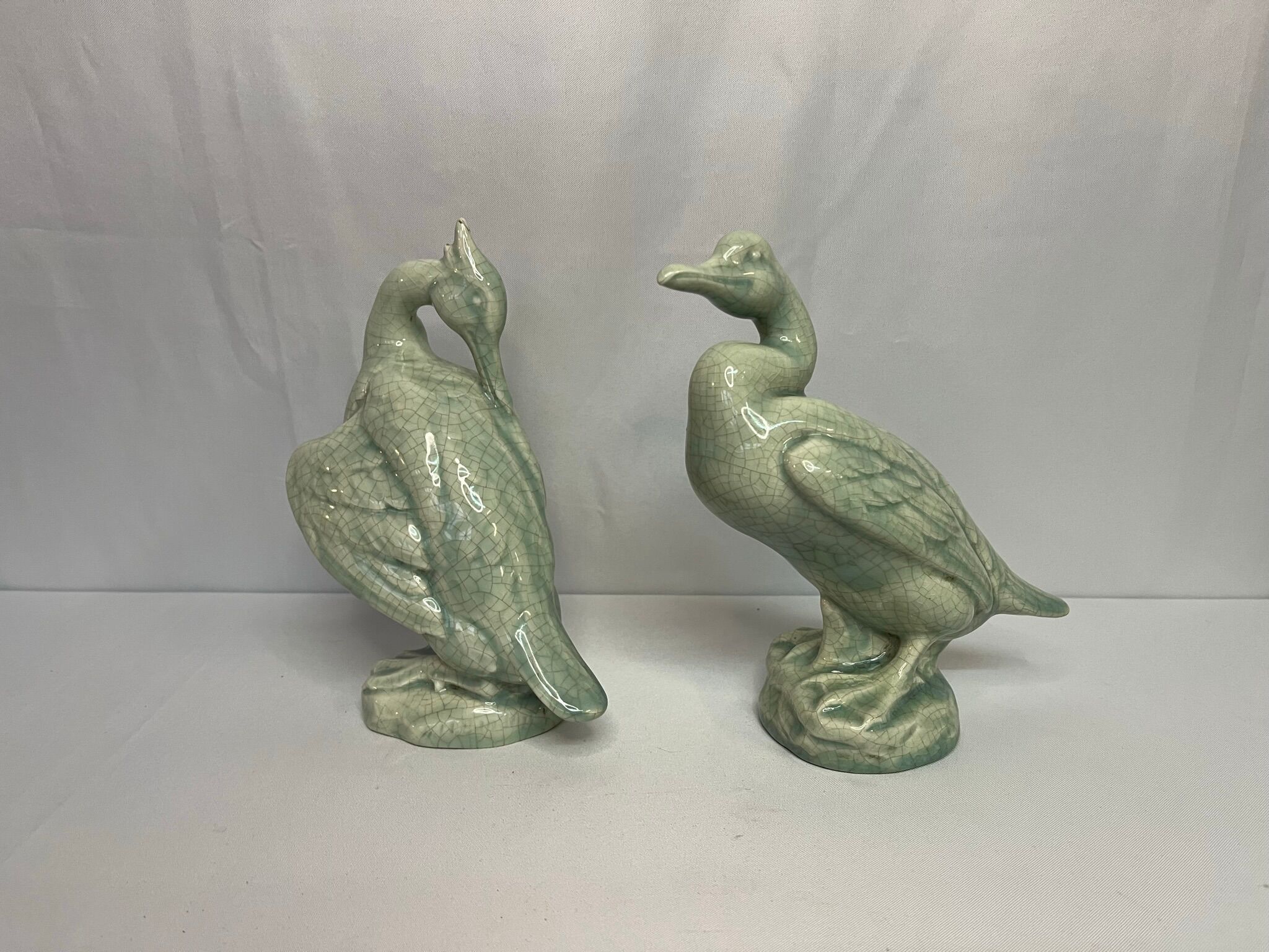 Art Deco Pair cormorants cracked ceramic signed circa 1940