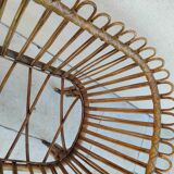 Vintage rattan bed on wheels cradle