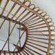 Vintage rattan bed on wheels cradle