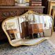 Louis-Philippe gilded mirror with shell pediment