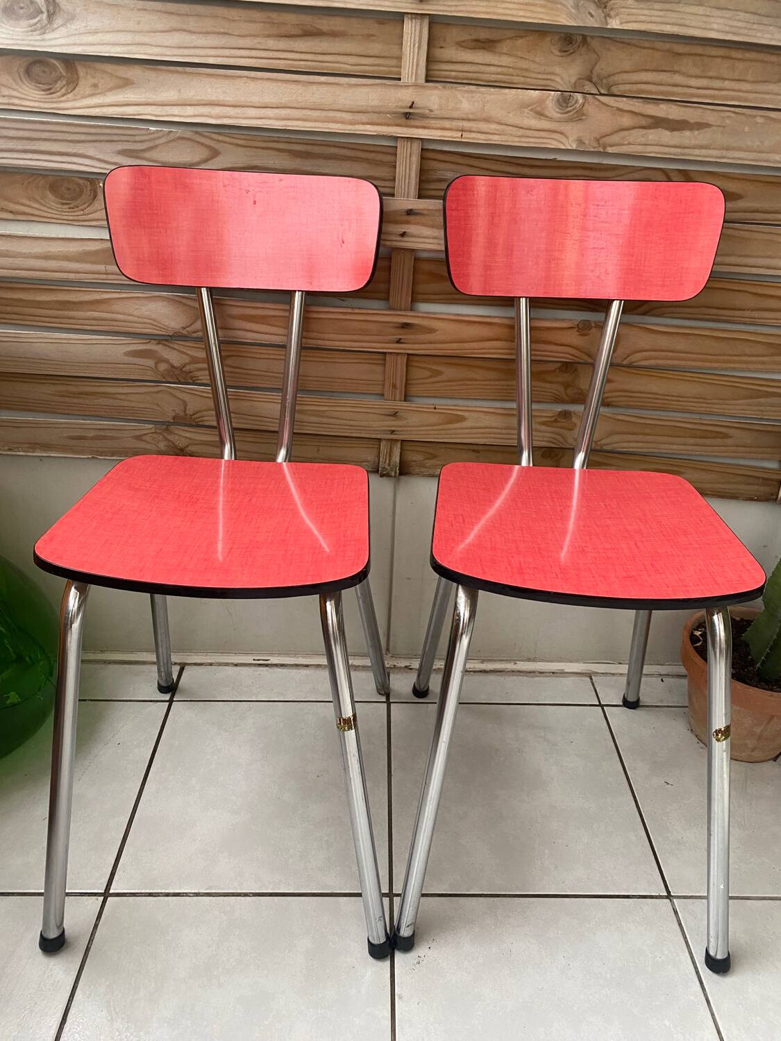 Pair of raspberry formica chairs