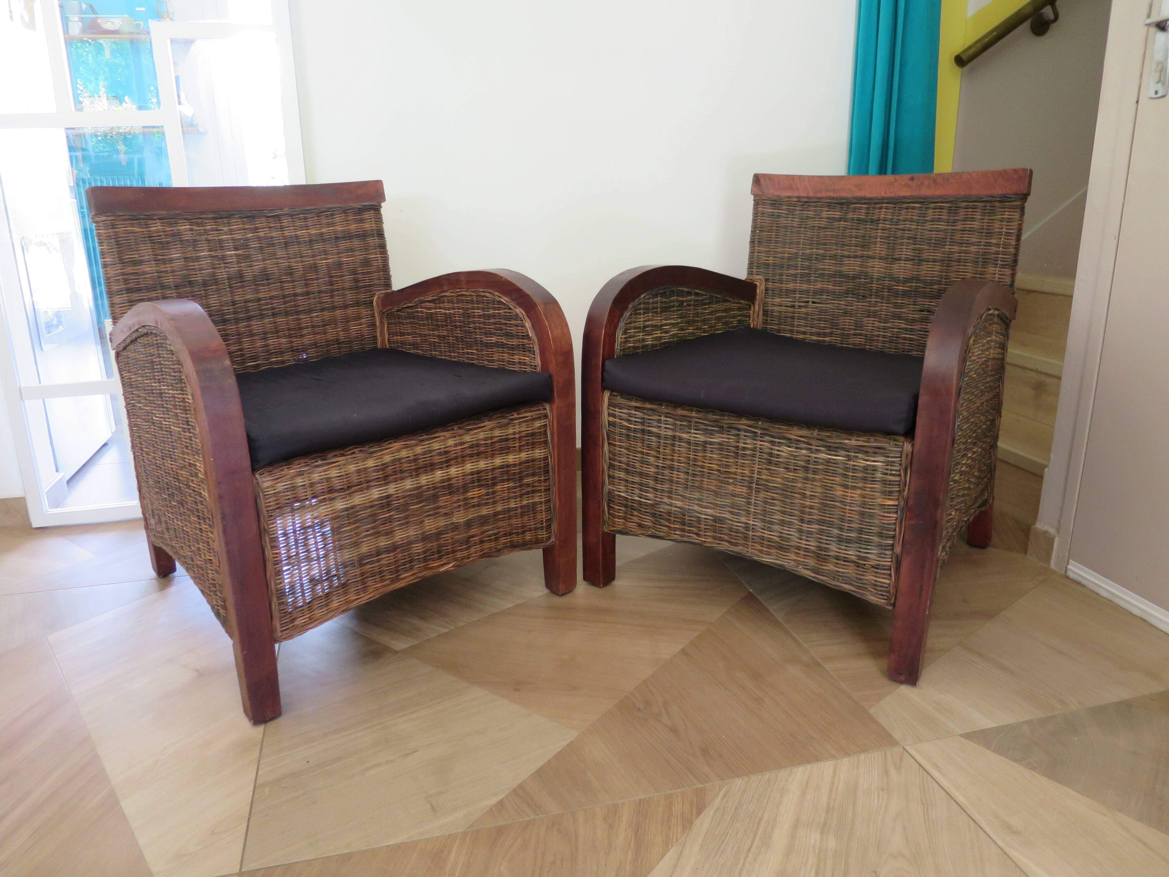 2 colonial-style armchairs in woven rattan and exotic wood