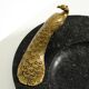 Beautiful, large black granite valet tray featuring a brass peacock, circa