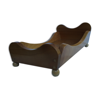 Wooden doll bed