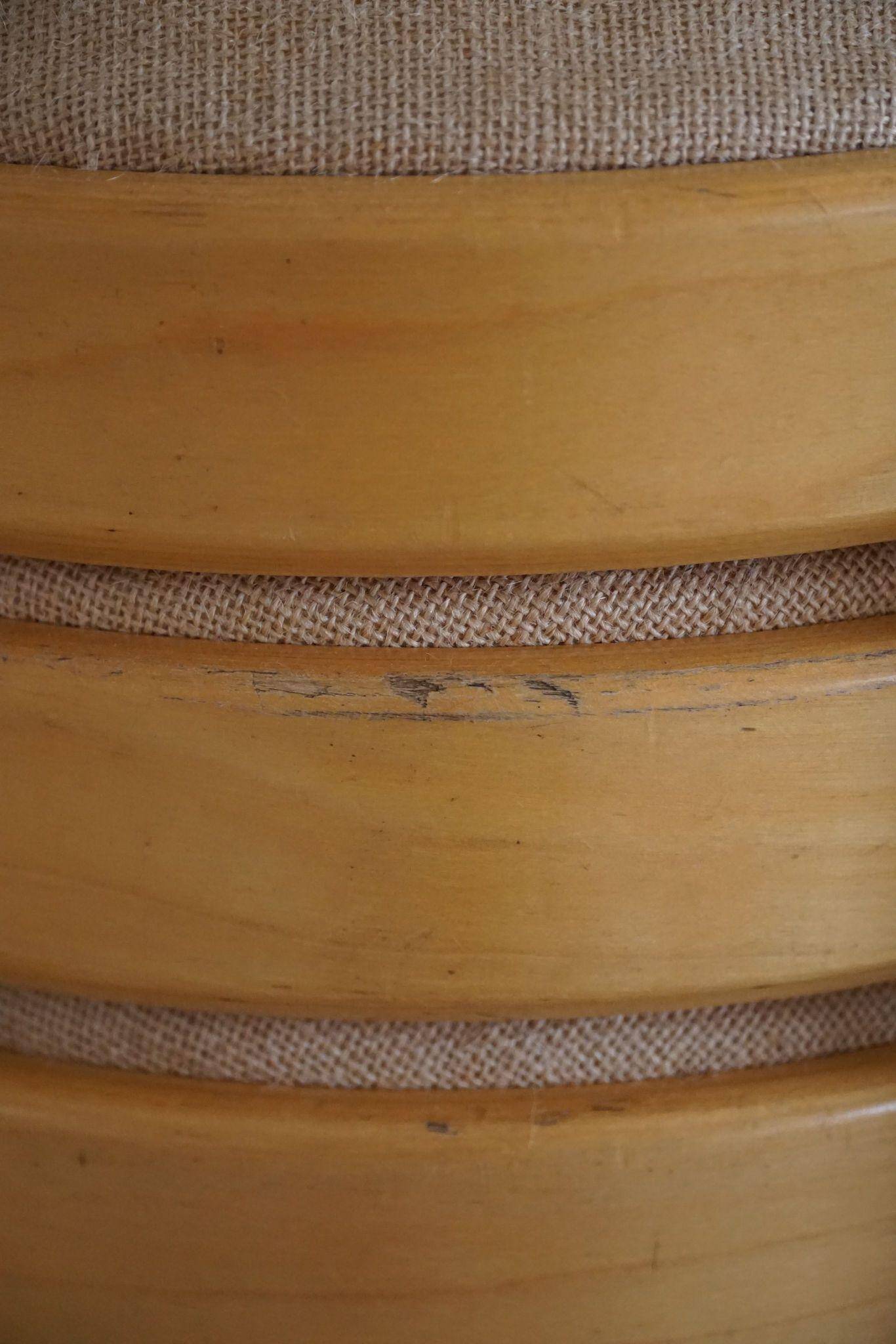 Modern Swedish, set of 14 stackable stools in birch and hessian fabric, 1980s.