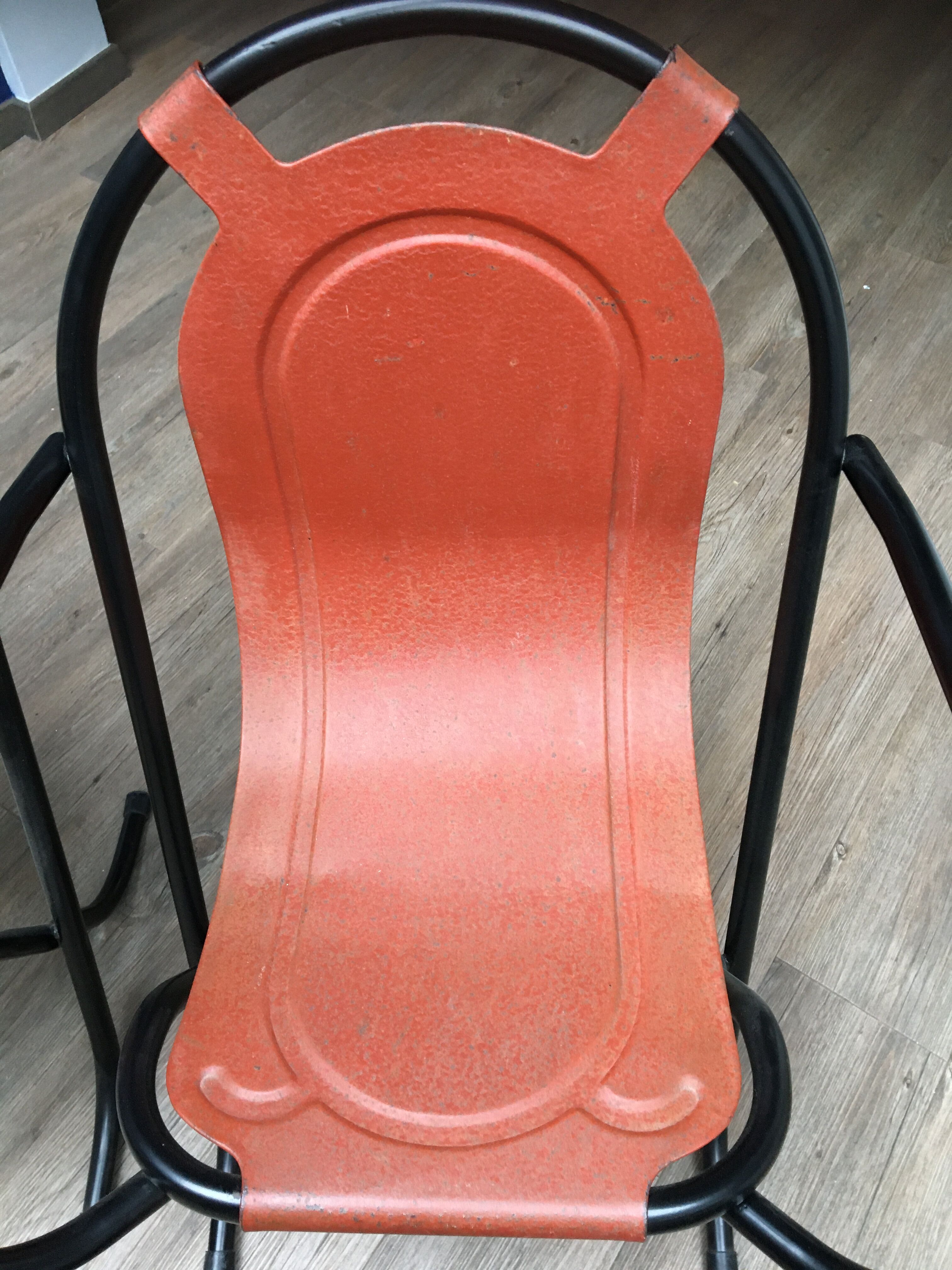 Pair of iron armchairs