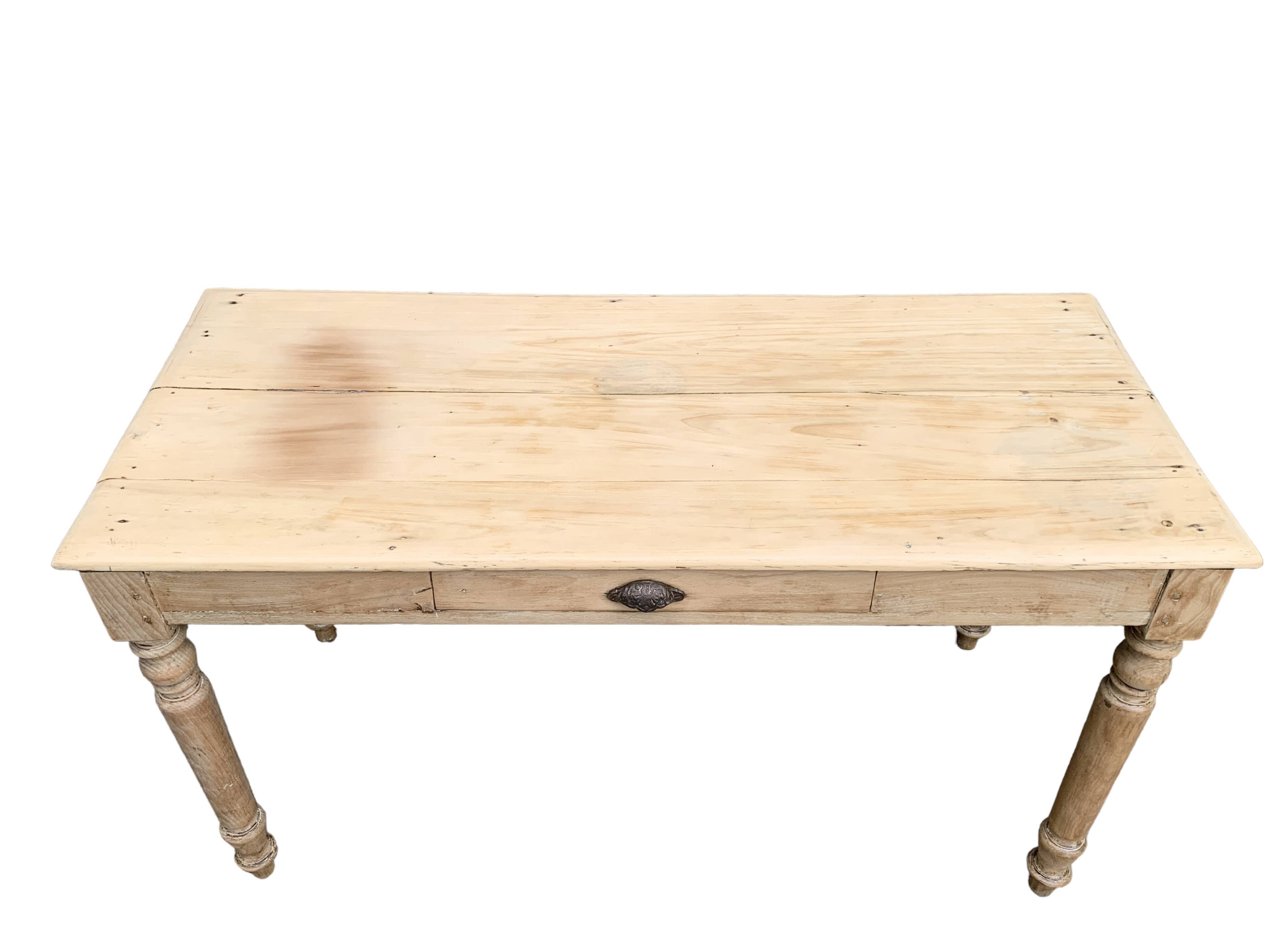 Raw wood farm table 1920