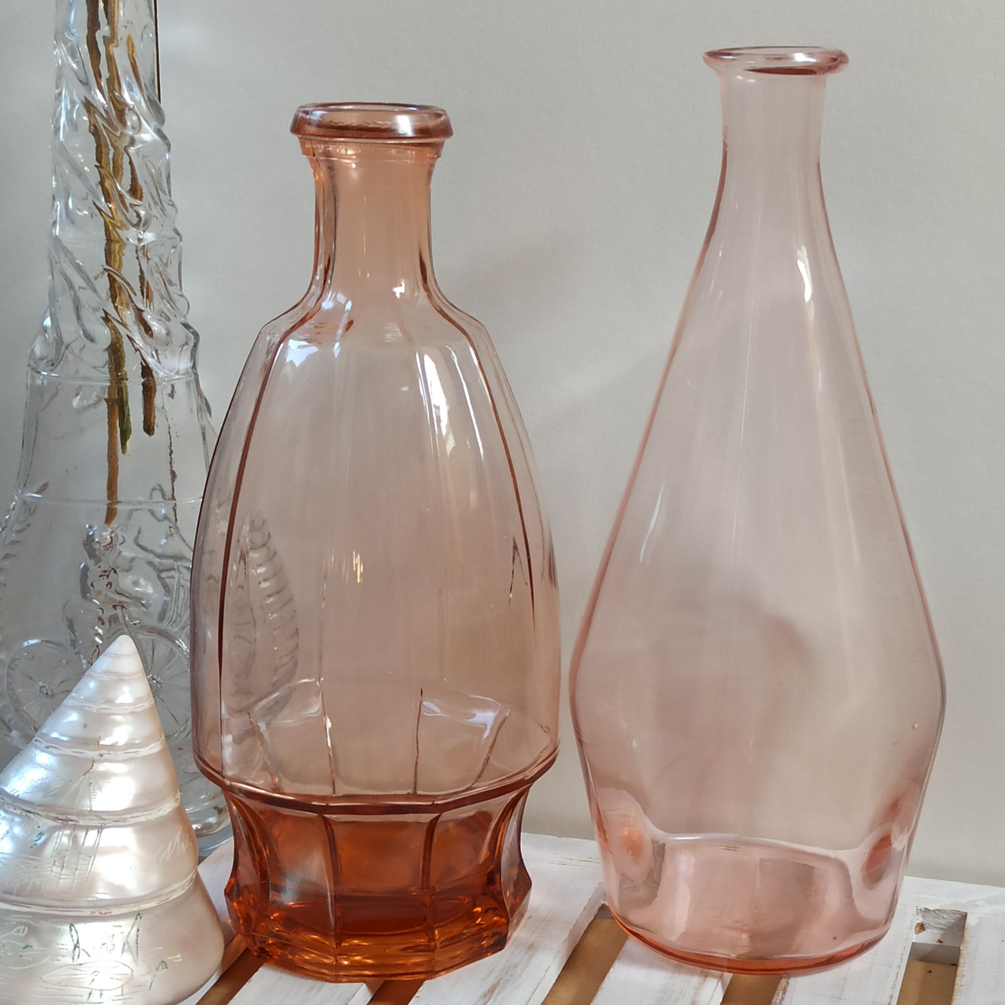 Vintage pink glass bottle vases