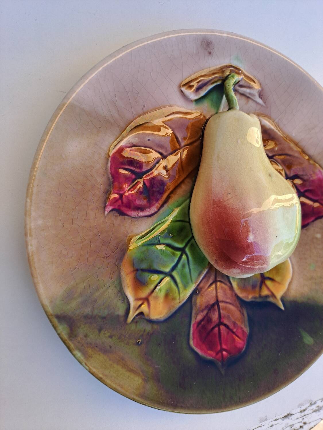 Pear slip plate in relief