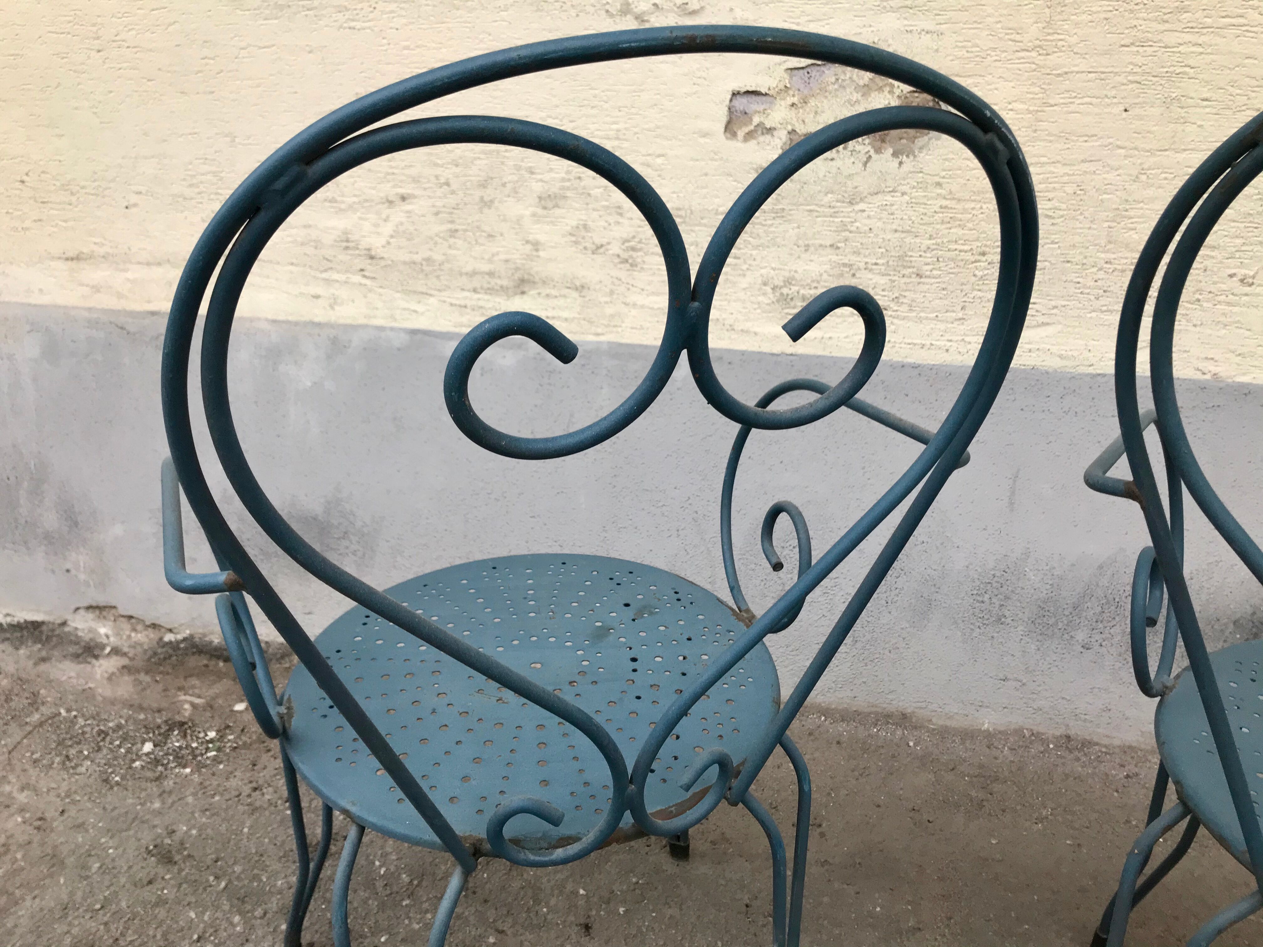 1 Table and 2 wrought iron garden chairs 1950 vintage