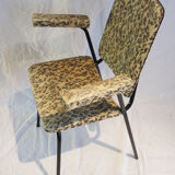 2 small black and white armchairs