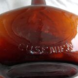 Ancienne bouteille Cusenier verre bullée marron