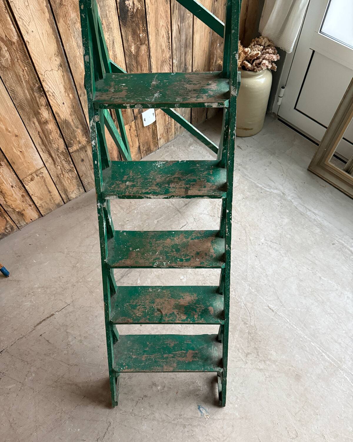Vintage stepladder with green patina