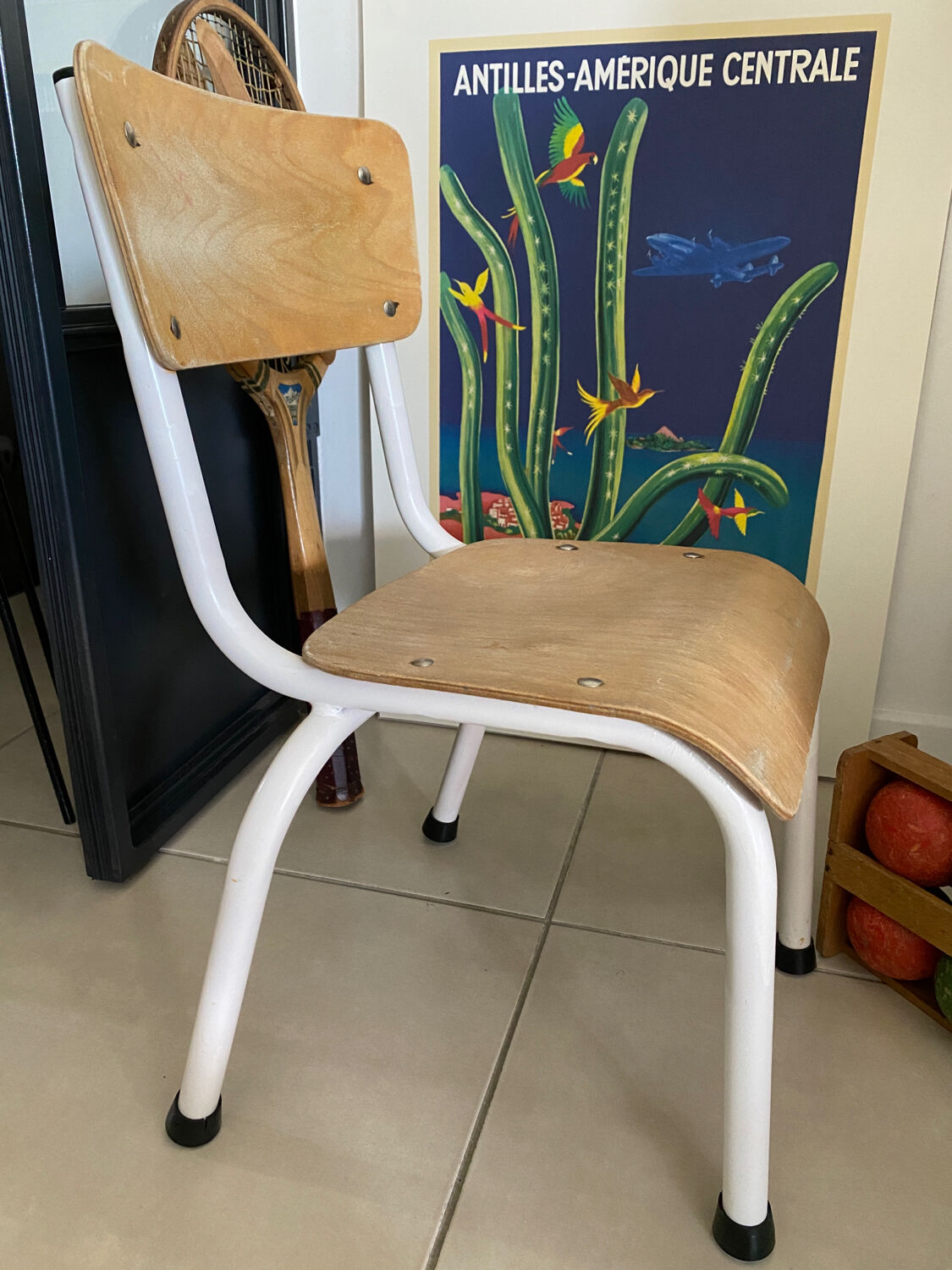 Old wooden and metal children's school chair