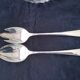 Salad bowl and serving cutlery in glass and silver metal