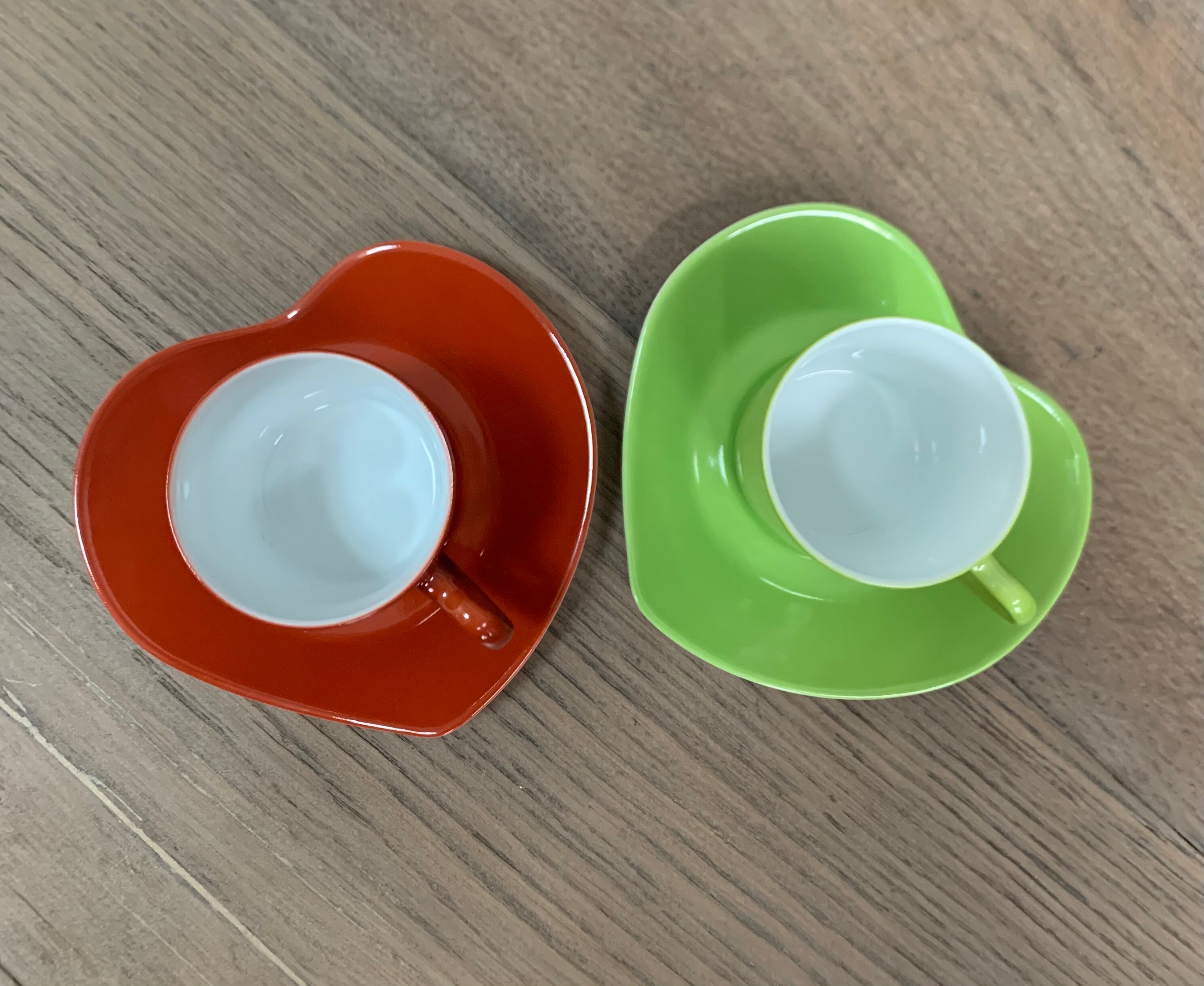 Two cups and saucers in porcelaine Yves Saint Laurent