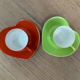 Two cups and saucers in porcelaine Yves Saint Laurent