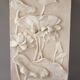 Bajorelief avec des fleurs. Relief avec des fleurs. Fleurs en relief.