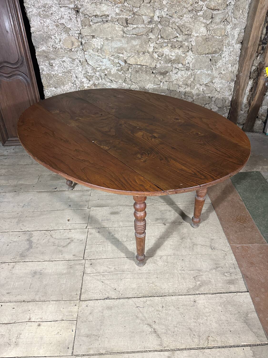 Ancienne table à volets ovale