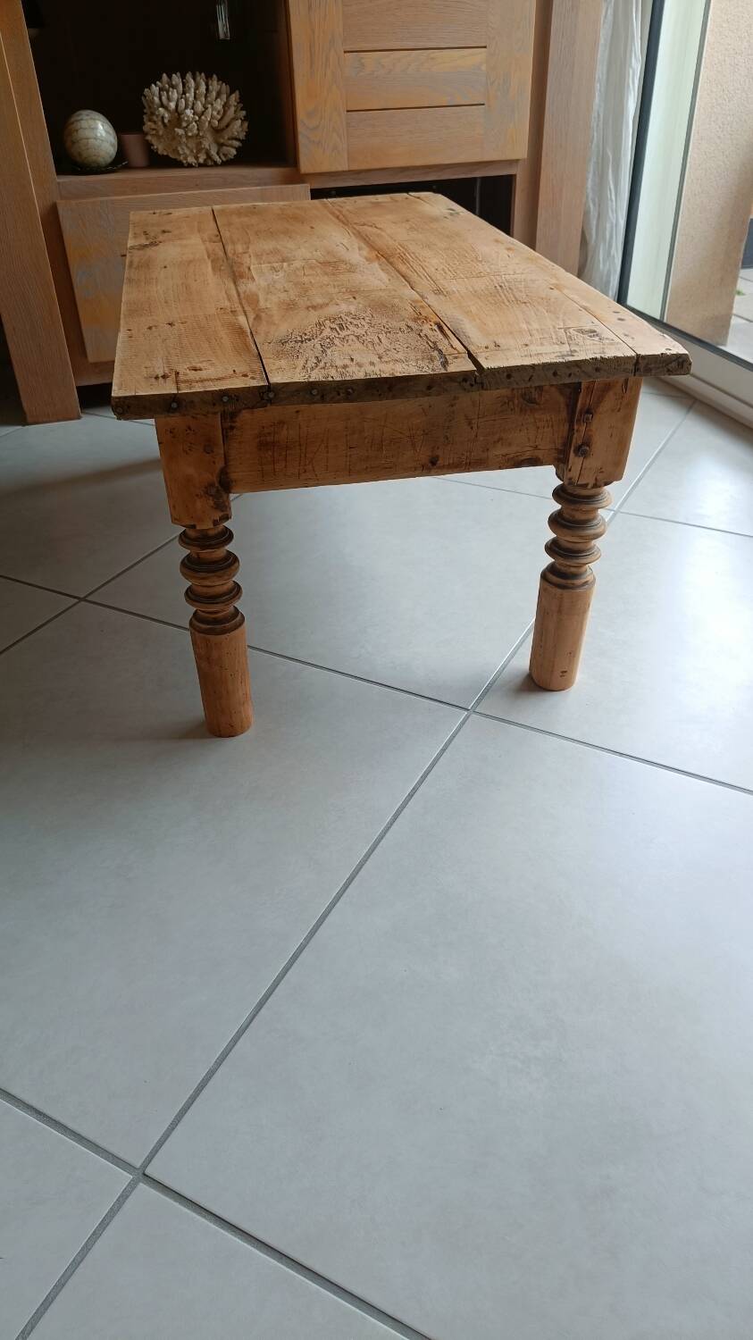 Raw wood coffee table in a country style