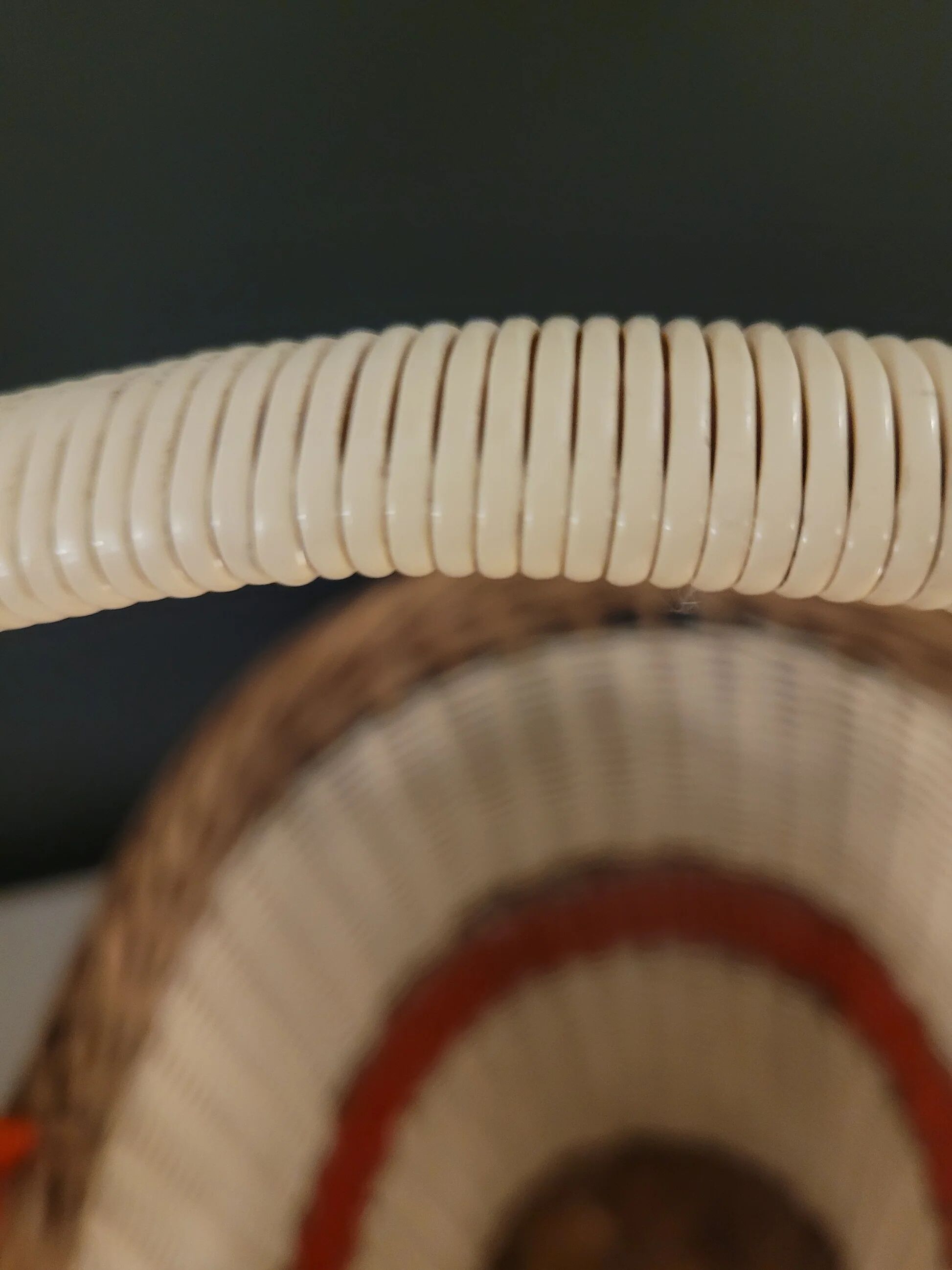 Old oval basket with a wooden base